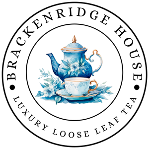 Circular Brackenridge House Tea Collection logo featuring a blue and white patterned teapot and teacup.